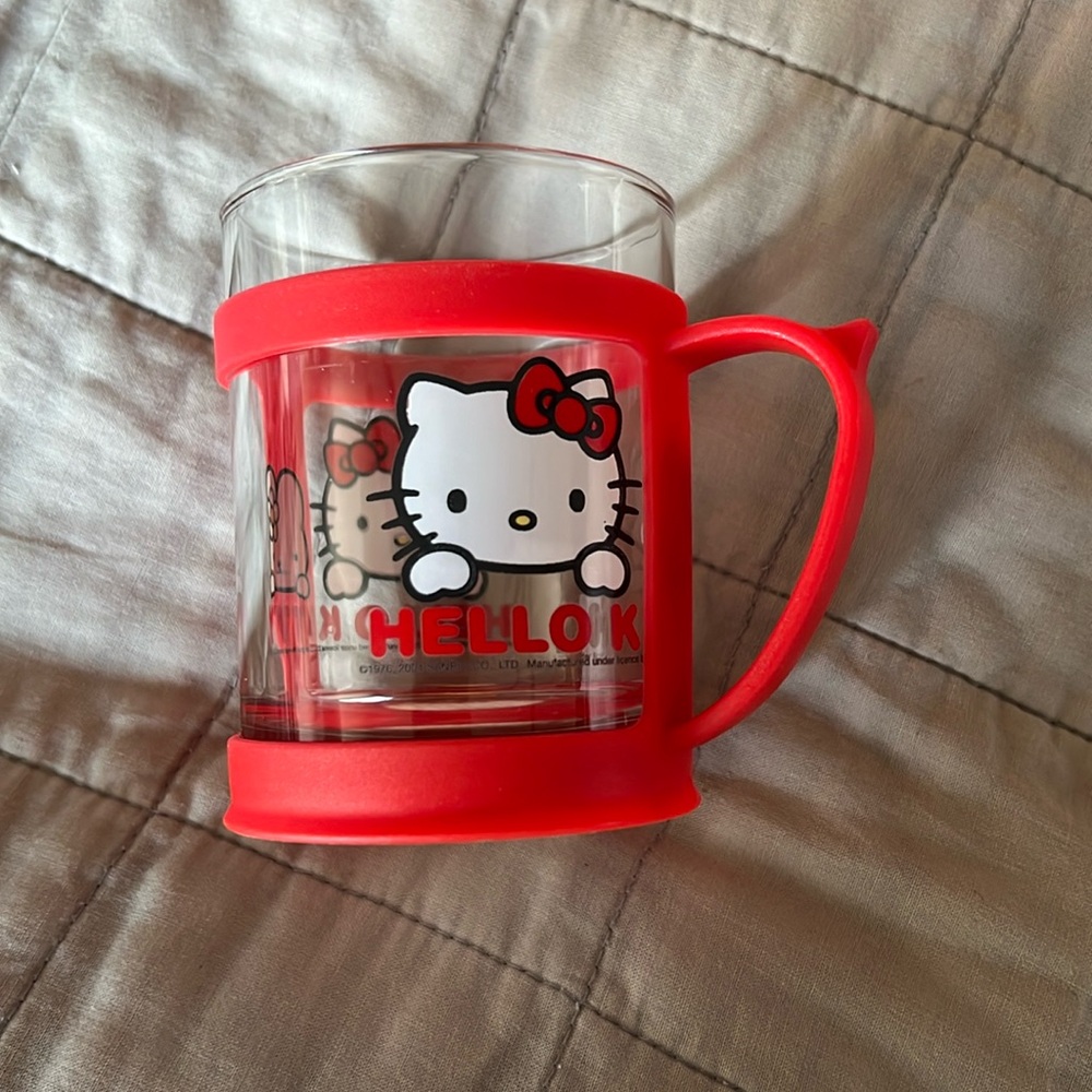 HELLO KITTY collectible glass with plastic holder in red